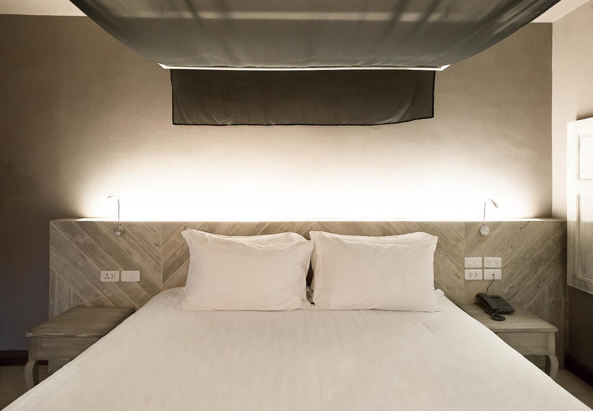 Art Mai Gallery Nimman Hotel Chiang Mai Eksteriør billede A bed